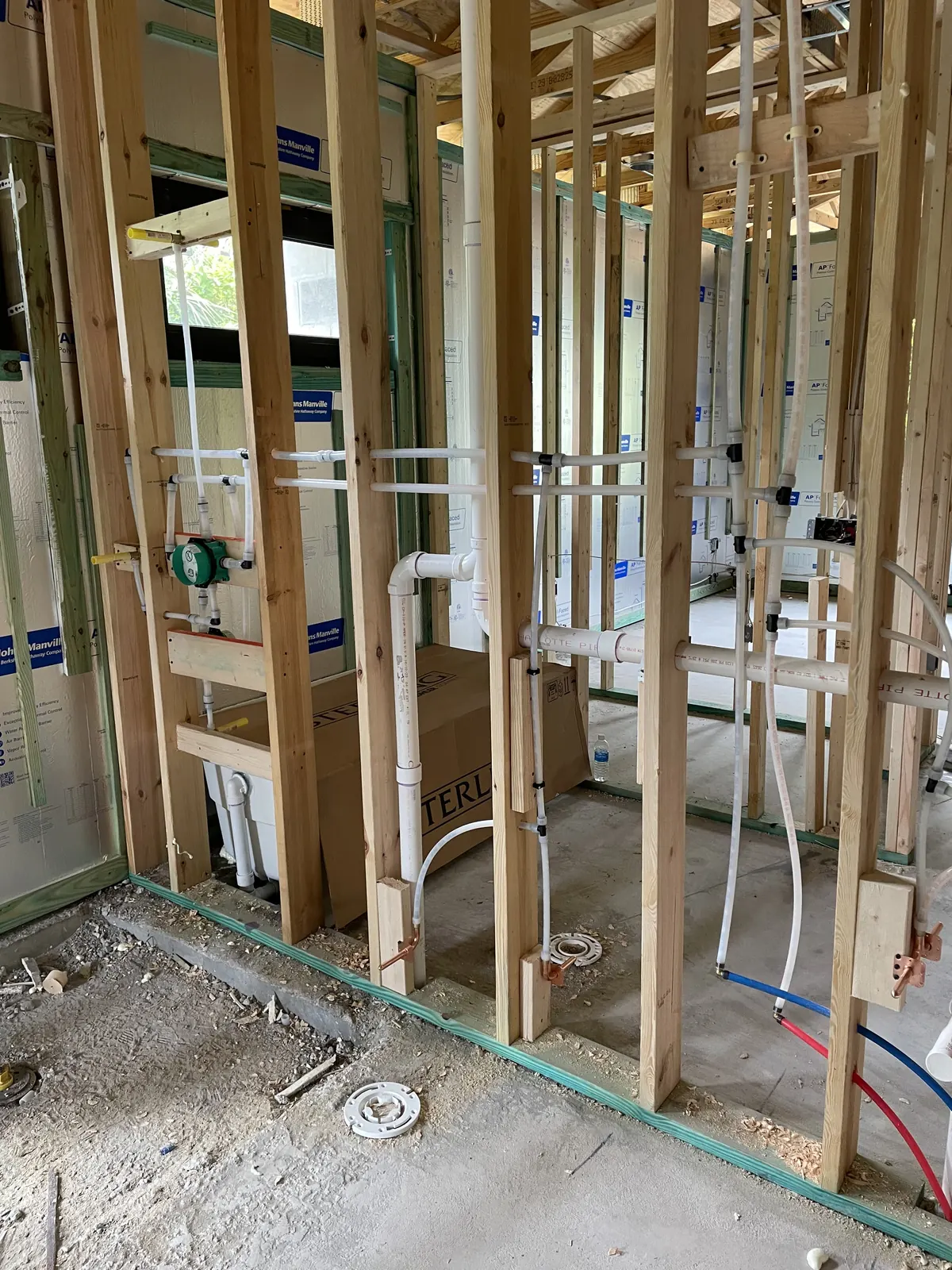 Multifamily rough-in plumbing across framed units by Power Plumbing