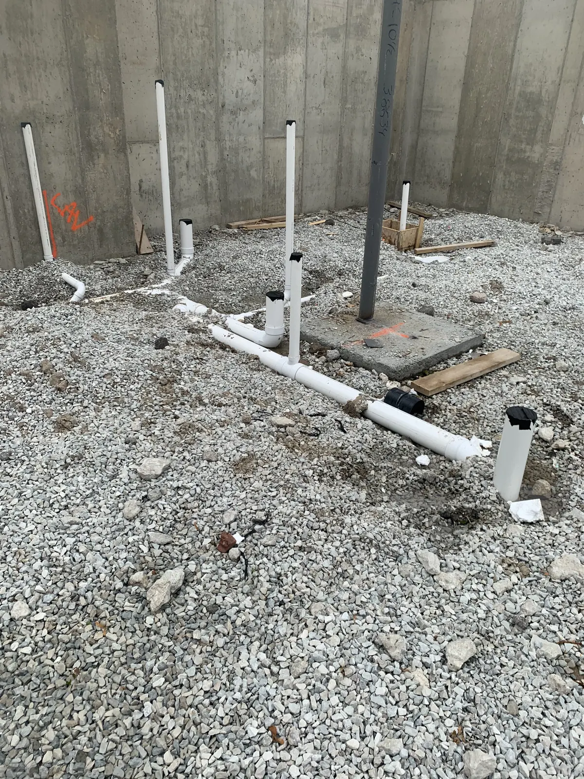 Underground plumbing rough-in before slab pour by Power Plumbing